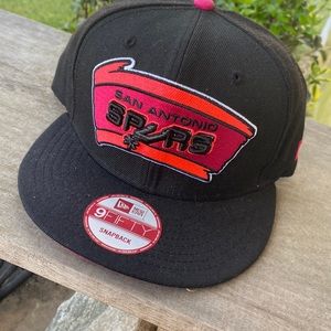 Black and pink Spurs hat